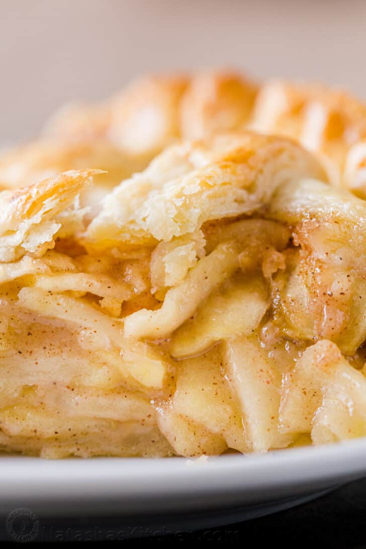 Baked granny smith apples in pie on a plate