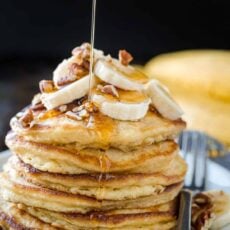 Banana pancakes stacked on a plate
