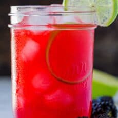 blackberry limeade garnished with limes
