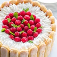 With step-by-step photos, you can master Raspberry Charlotte Russe Cake! A Charlotte Dessert with layers of raspberry mousse, lady fingers and fluffy cake.