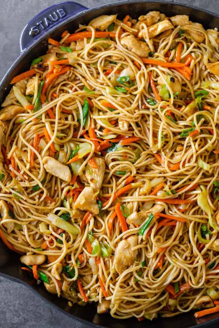 Chicken chow mein in a pan.