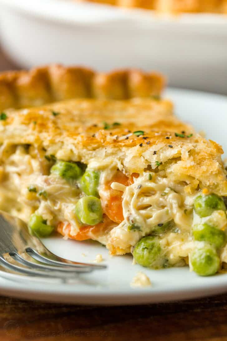 Chicken pot pie served on a plate with fork
