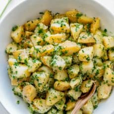 The BEST potatoes recipe is the simplest. Company potatoes always get compliments! The parsley and butter really bring out the flavor of yukon potatoes | natashaskitchen.com
