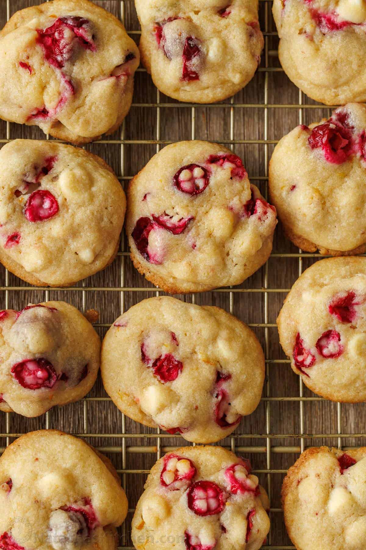 Cranberry white chocolate cookies cooling on a wire rack
