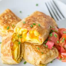 Egg, Ham and Cheese Crepes Pockets - Our son's favorite breakfast and they are freezer friendly! | natashaskitchen.com