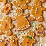 decorated gingerbread cookies with homemade icing and holiday candies