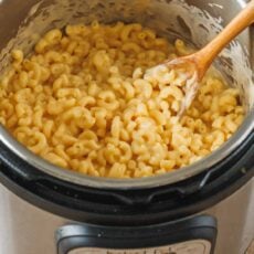 Instant pot with mac and cheese and serving spoon