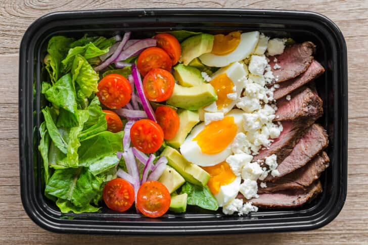 Steak cobb salad in meal prep container