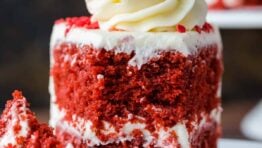 Red Velvet Cake with cream cheese frosting on a plate