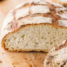 This Crusty French Bread is the perfect blend of chewy and super soft. Learn the secret to the crispiest crust that crackles and crunches as you slice.