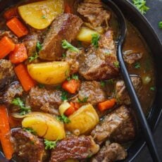Slow cooker beef stew served in a bowl