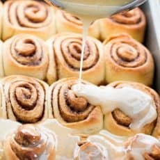 These Cinnamon Rolls are soft, fluffy, cinnamony, buttery and crowned with a lavish amount of salted maple glaze. I fell in love when I tried these.
