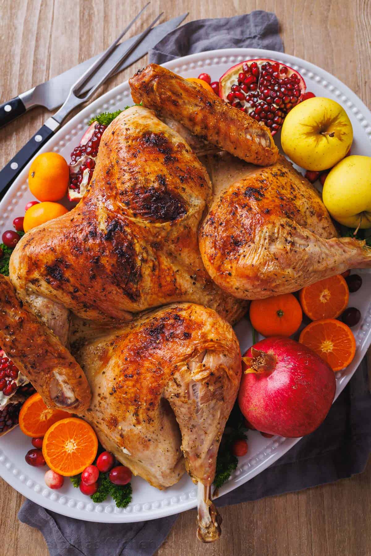 Roasted spatchcock turkey on a serving platter