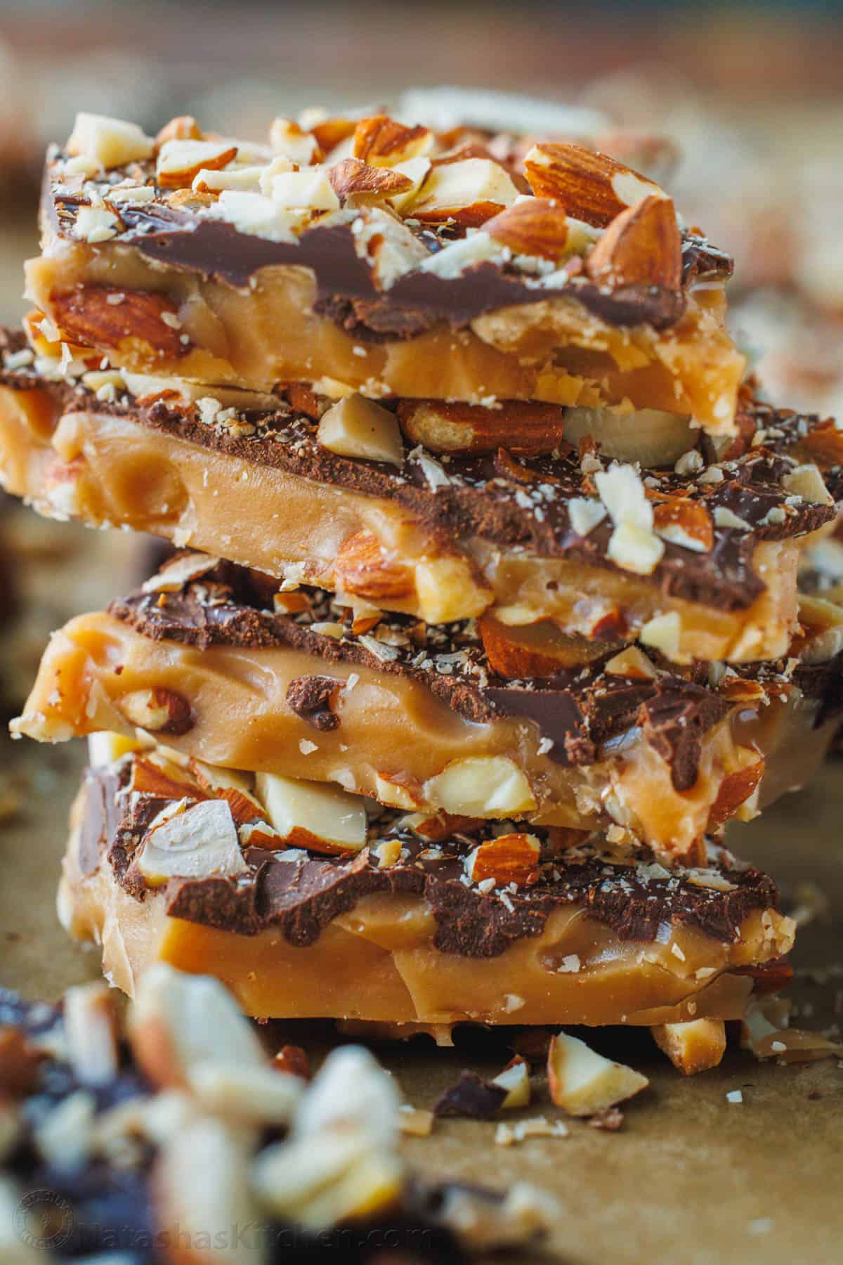 Toffee candy stacked up high with almonds and chocolate