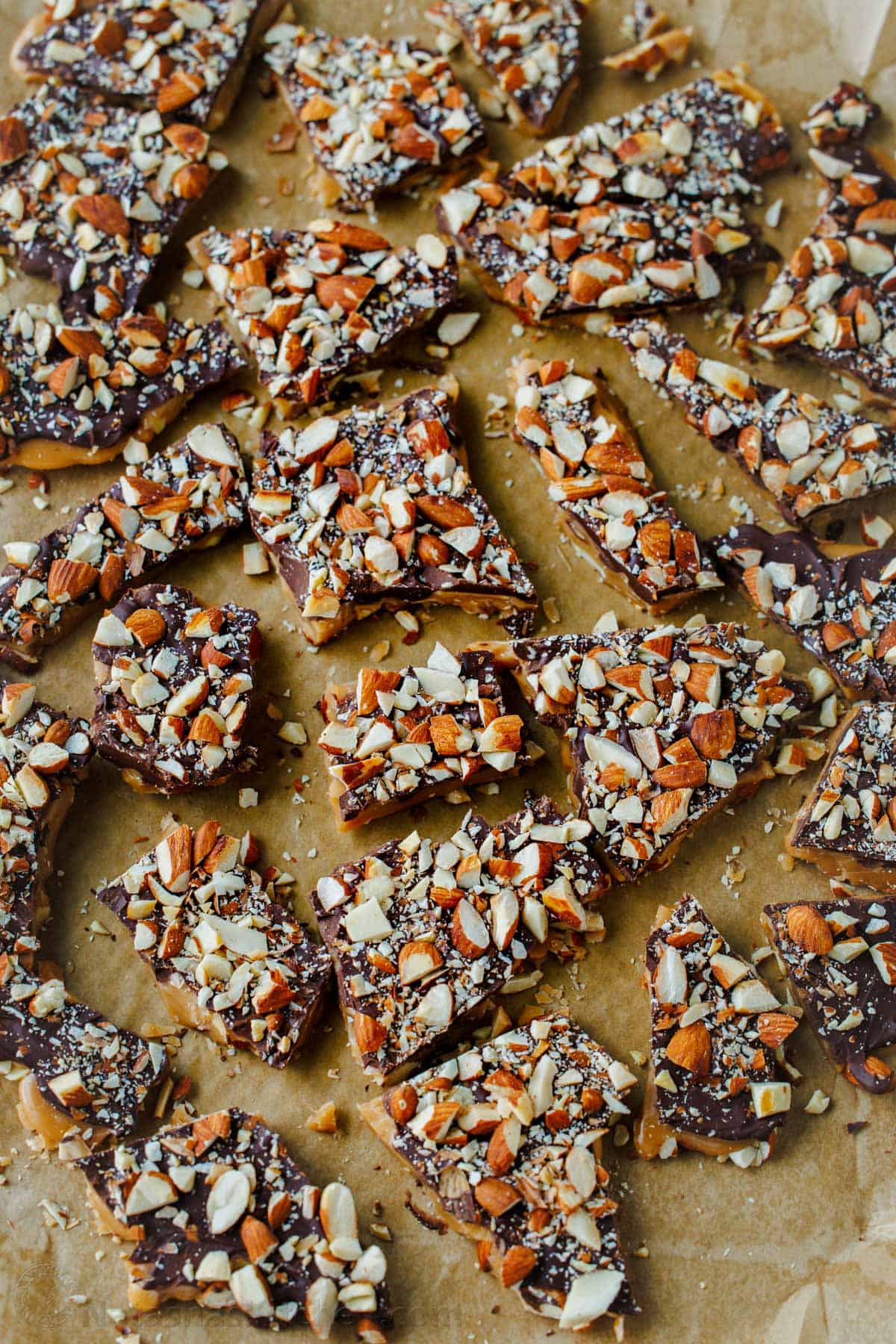 Broken up pieces of English Toffee on a baking sheet