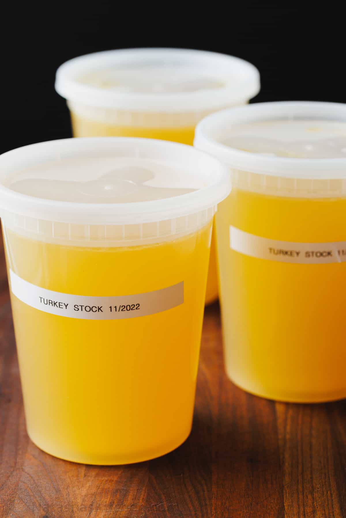 Containers of turkey stock for freezing