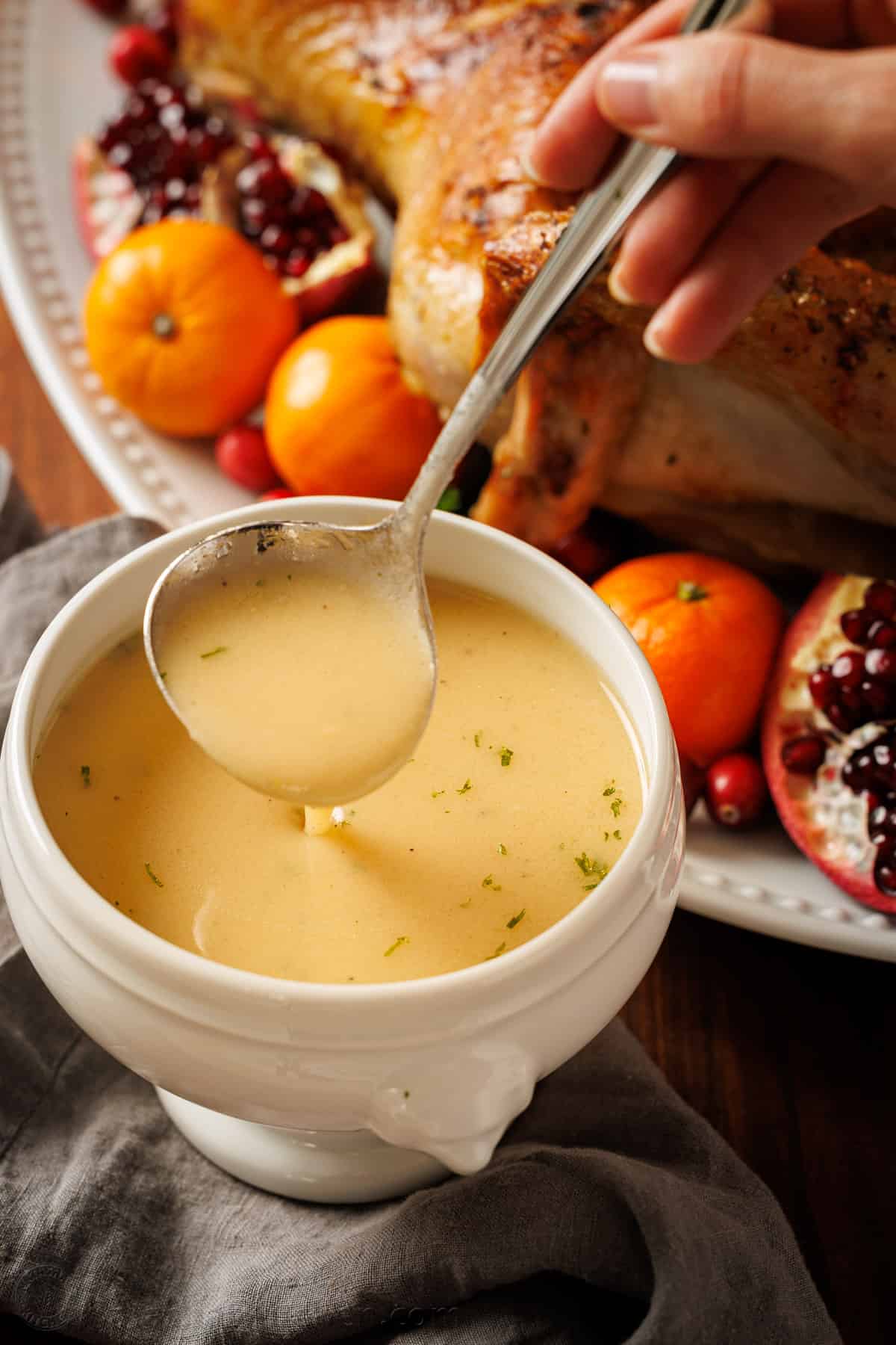 Thanksgiving sauce made with pan drippings in a serving dish